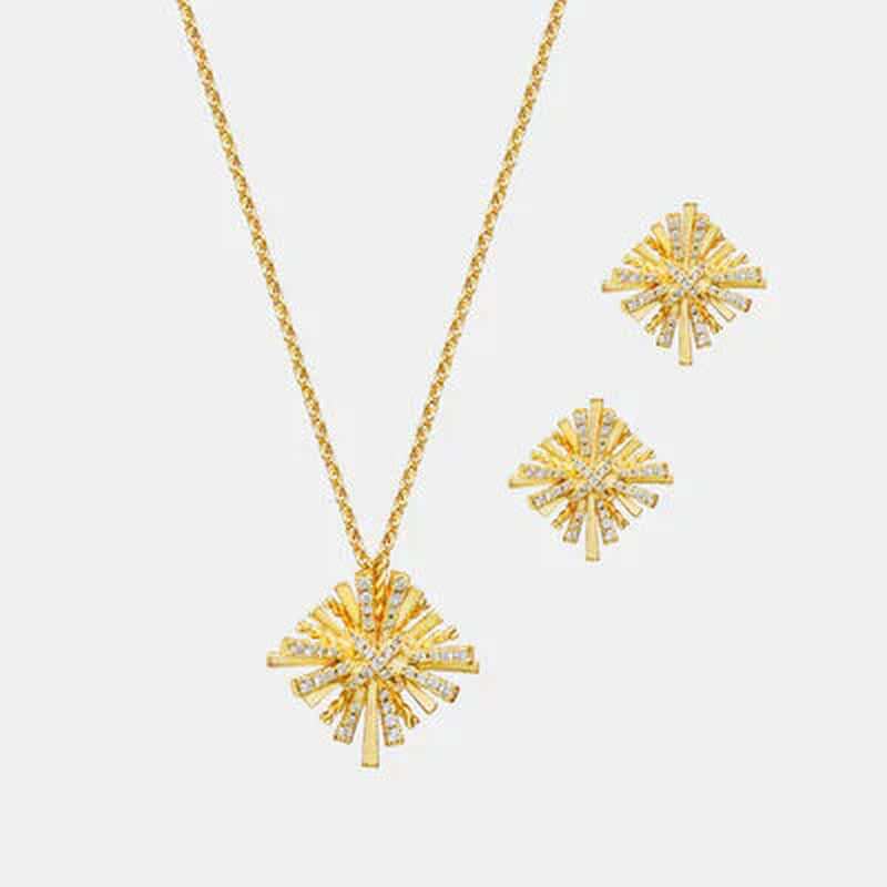 Dainty Starburst gold plated jewelry set featuring a pendant necklace and matching earrings embellished with zircon stones.
