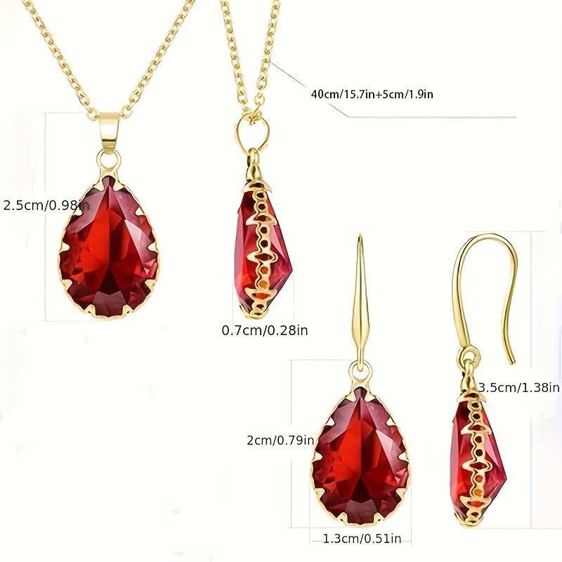Dazzling rose gold necklace and earrings set with pear-shaped red cubic zirconia gemstones.