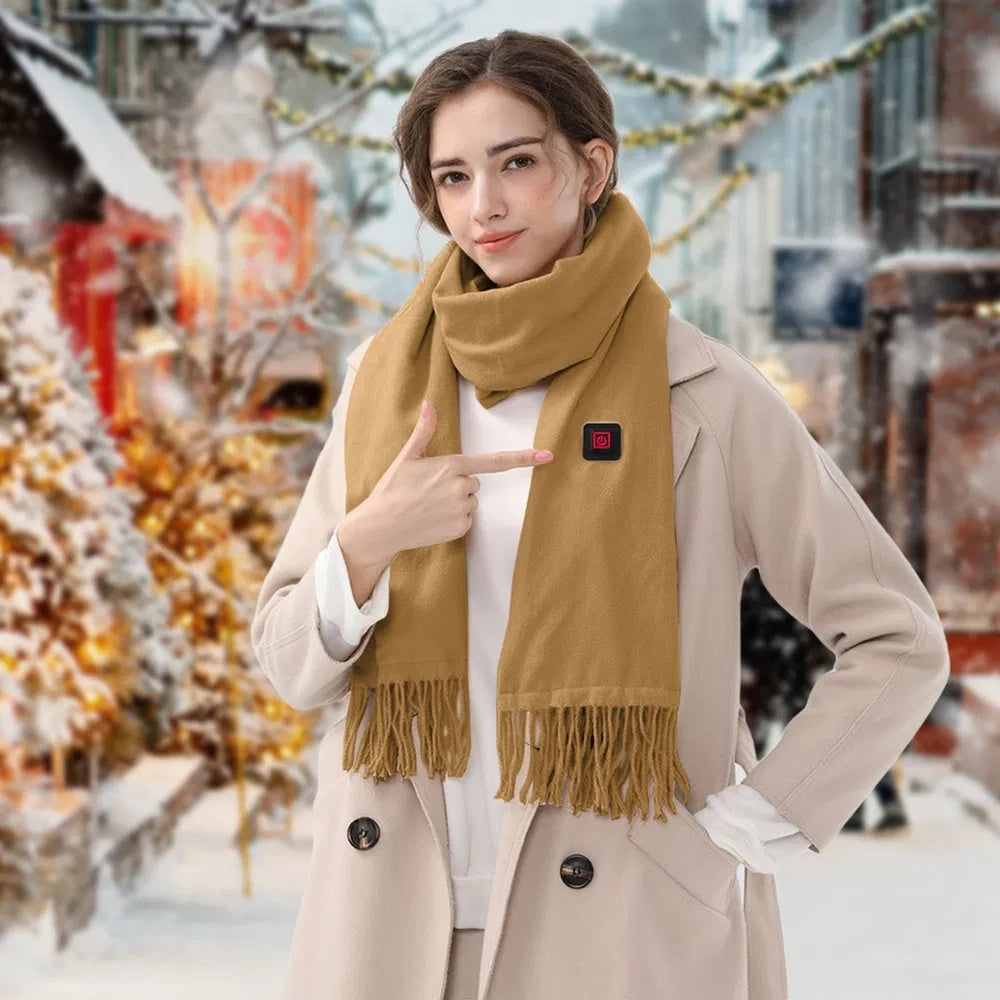 Woman showcasing electric heated winter scarf in snowy outdoor setting, highlighting USB heating feature for comfort.