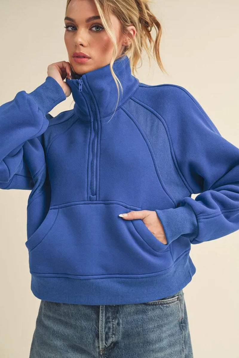 Dove Funnel Neck Half Zip in blue, featuring cozy oversized fit and breathable fabric, perfect for year-round comfort.