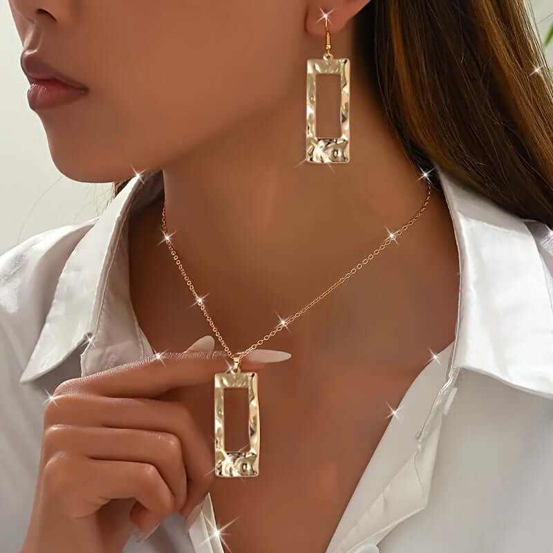 Eco-friendly geometric rectangular pendant necklace and earrings set worn by woman