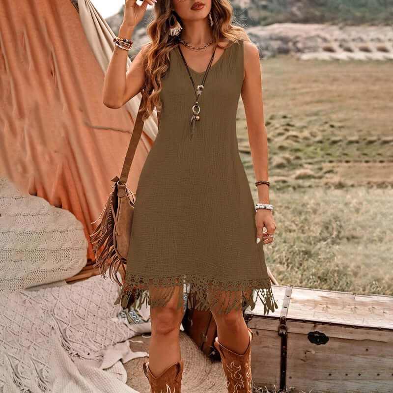 Women's boho dress with V-neck and fringe detail, perfect for summer outings in a stylish olive green color.