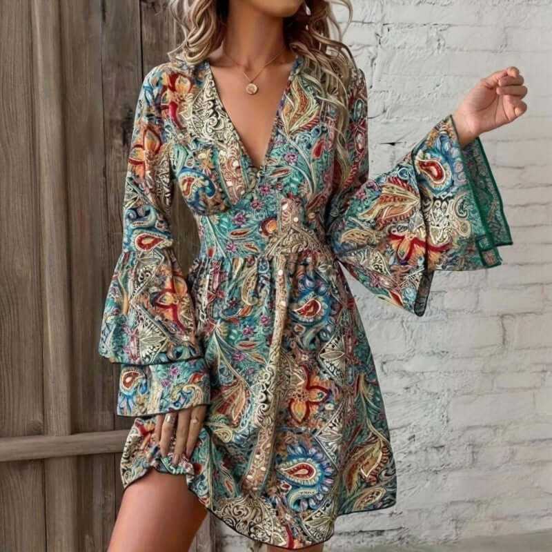 Elegant floral print dress with layered bell sleeves, V-neckline, perfect for spring and summer occasions.