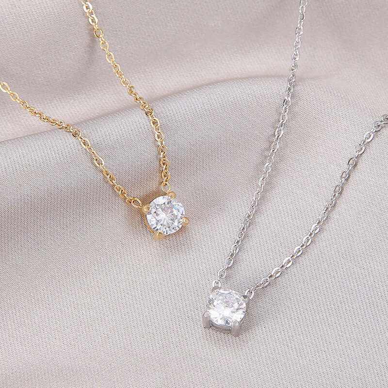 Elegant Zircon Birthstone Necklaces in gold and silver, showcasing dazzling zircon stones on delicate chains.