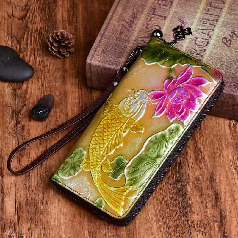 Stylish embossed wallet featuring koi fish and lotus design, perfect for a unique fashion statement.