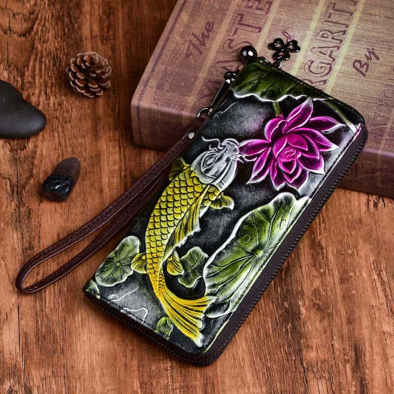 Handcrafted leather wallet featuring embossed koi fish and lotus design, perfect for stylish women.