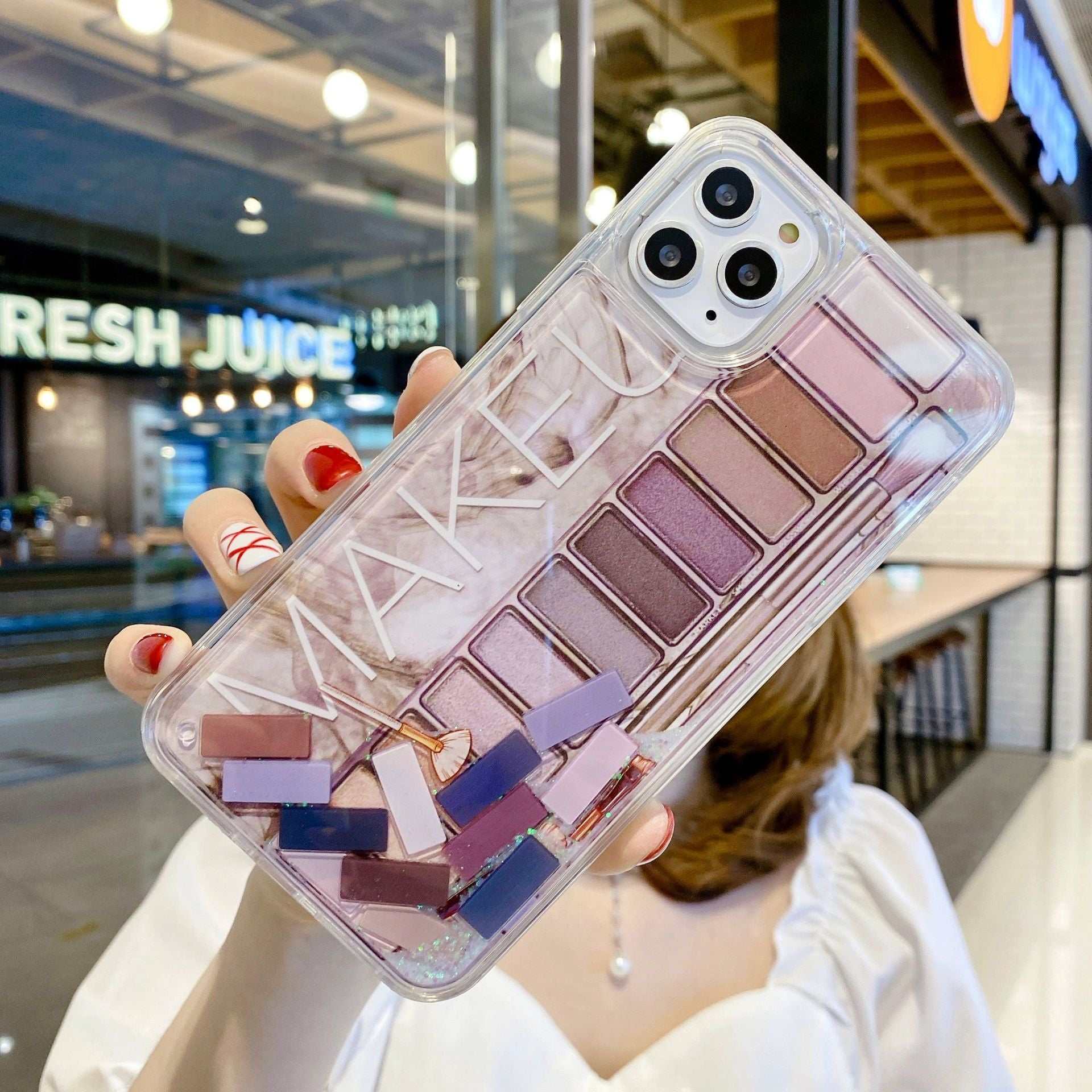 Clear phone case with eyeshadow palette cosmetics design and anti-fall protection