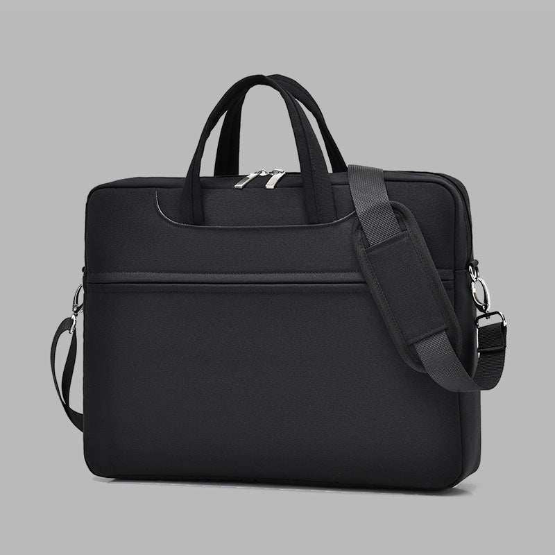 Large capacity laptop bag for men in black, waterproof Oxford cloth, designed for comfort and functionality.
