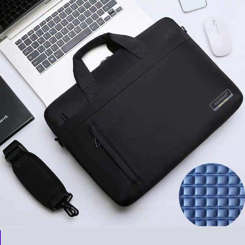 Waterproof shoulder bag for laptops, black nylon computer bag, compatible with various laptop sizes, stylish and functional.
