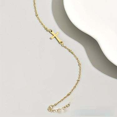 gold electroplated fashion best-seller cross bracelet with geometric design and chain link
