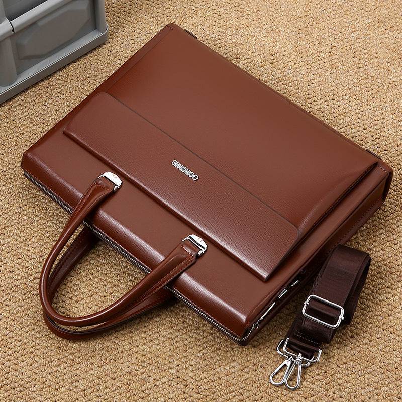 Anti-theft crossbody handbag in brown color with sturdy handles and detachable shoulder strap.