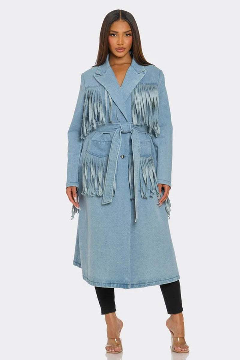 Fringed longline denim trench coat with waist belt, layered detailing, and stylish look, perfect for edgy fashion statements.
