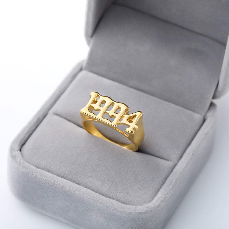 Gold stainless steel futuristic and vintage cyberpunk style ring with 1994 design in gray velvet box