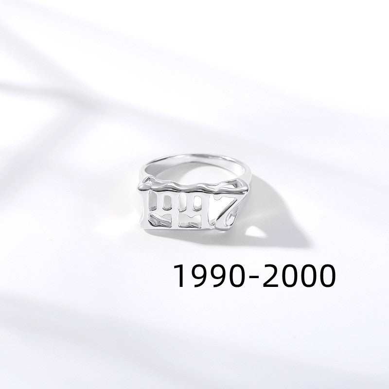 Silver futuristic and vintage cyberpunk style ring with "1990-2000" design in stainless steel