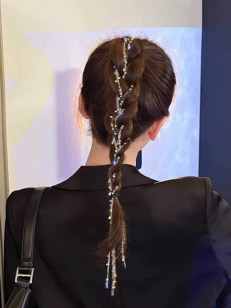 Woman's braid decorated with rhinestone star hair braid side chain clip accessory