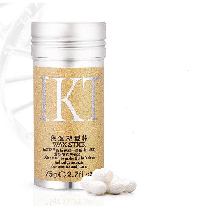 IKT hair wax stick in gold packaging with white wax beads for short hair styling and finishing