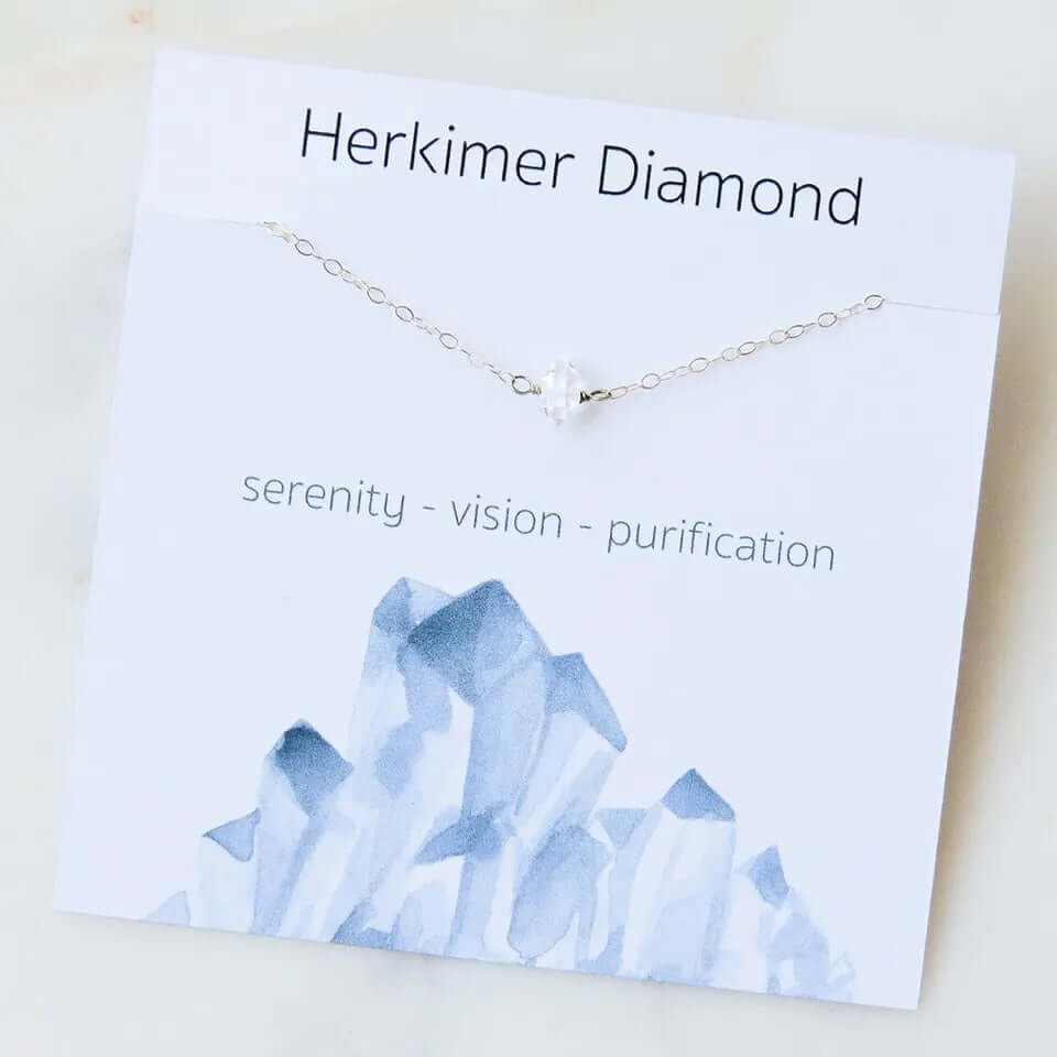 Herkimer diamond bracelet on card showcasing serenity, vision, and purification with a crystal illustration design.