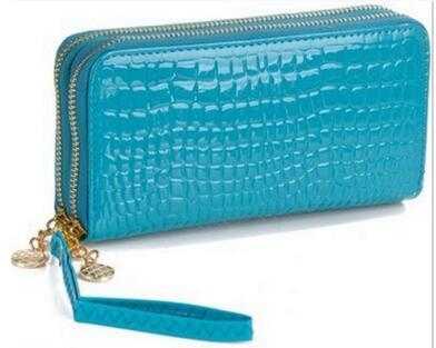 Blue women's leather wallet with crocodile texture and wrist strap