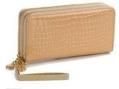 Beige women's leather wallet with crocodile texture and gold zipper detail