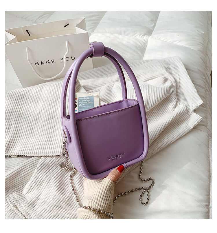 Purple women’s luxury designer mini chain handbag with square shape and metal chain strap