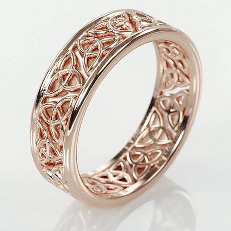 Rose gold hollow flower ring for women with intricate geometric design