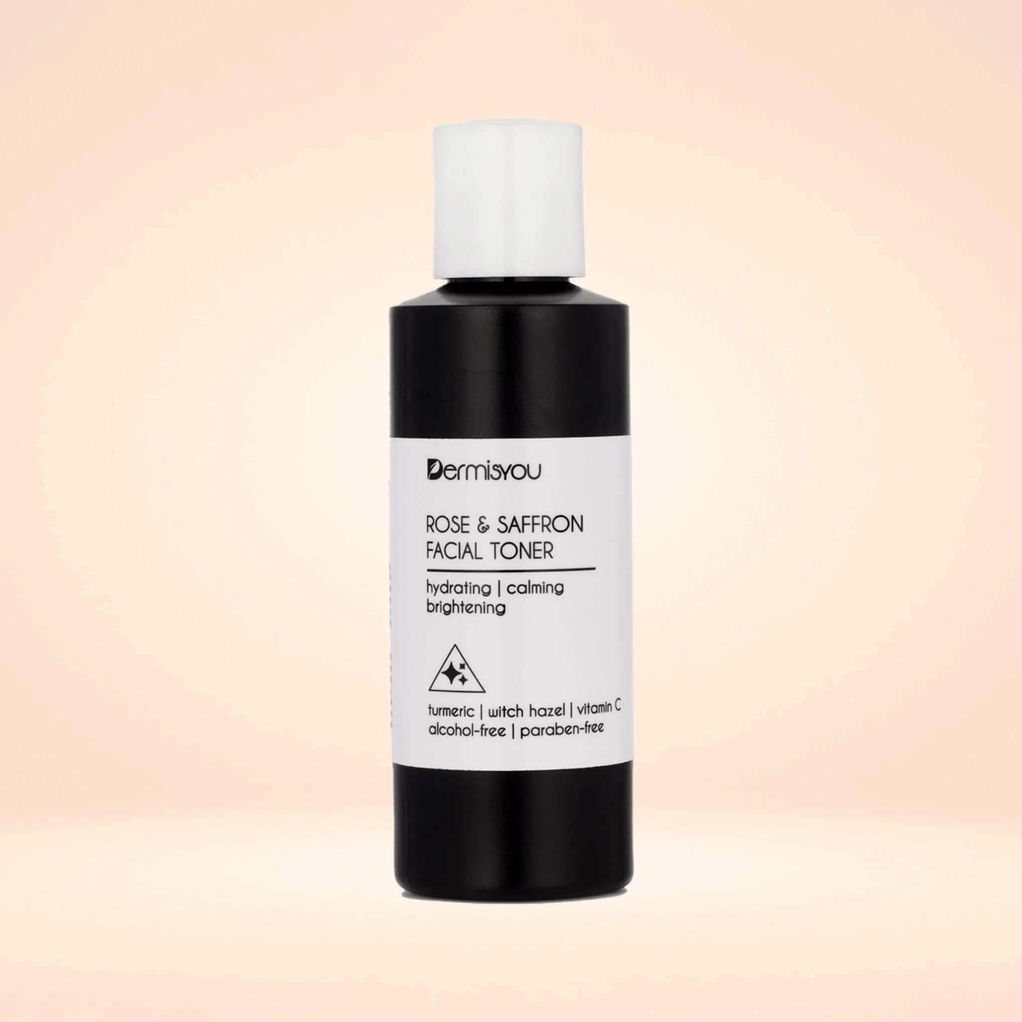 Hydrating Rose and Saffron Facial Toner bottle on a soft pastel background, alcohol-free and paraben-free skincare product.