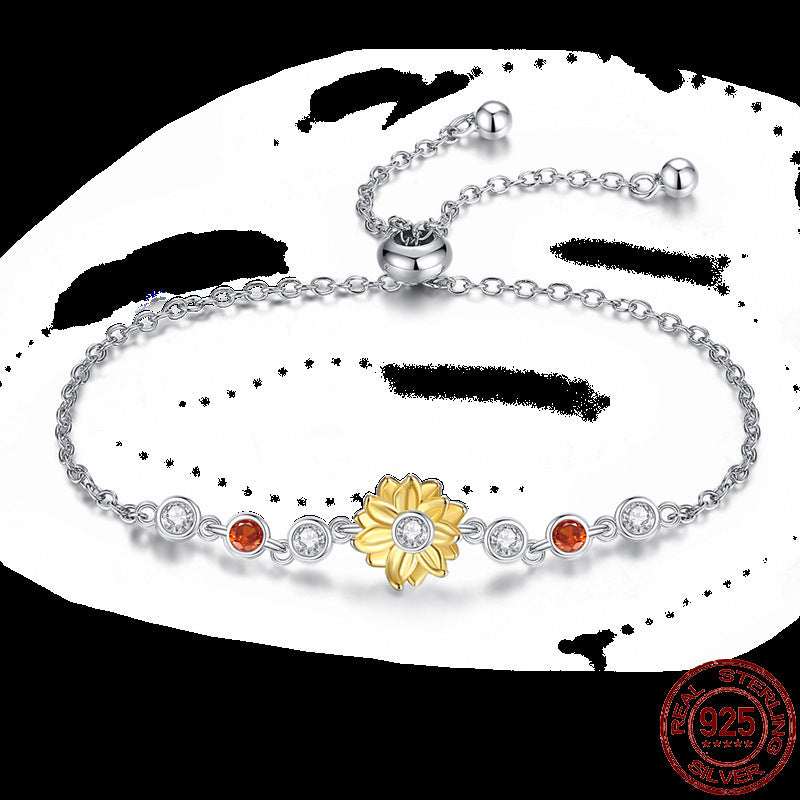Infinity Hamsa sterling silver bracelet with gold flower and gemstone accents.