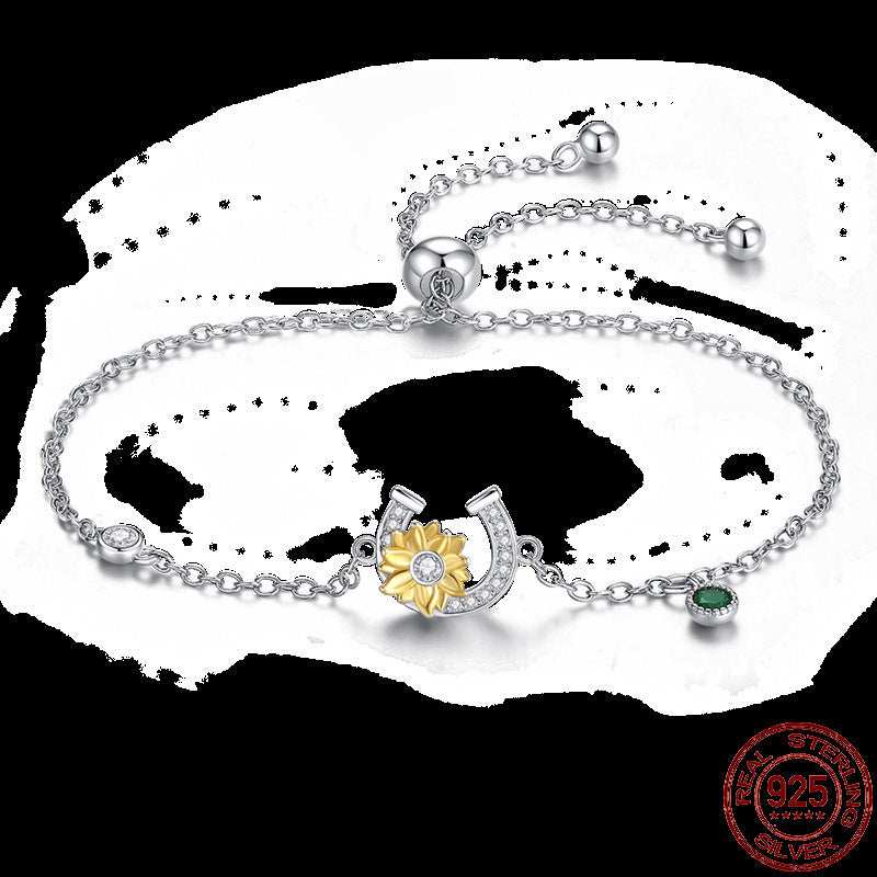 Sterling silver Infinity Hamsa bracelet with sunflower and green gemstone charm