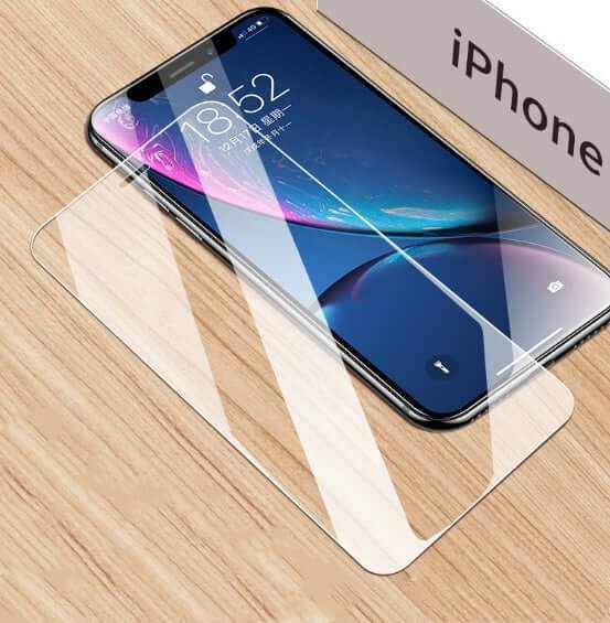 Tempered glass screen protector laid on an iPhone device, showcasing clarity and fit for protection.
