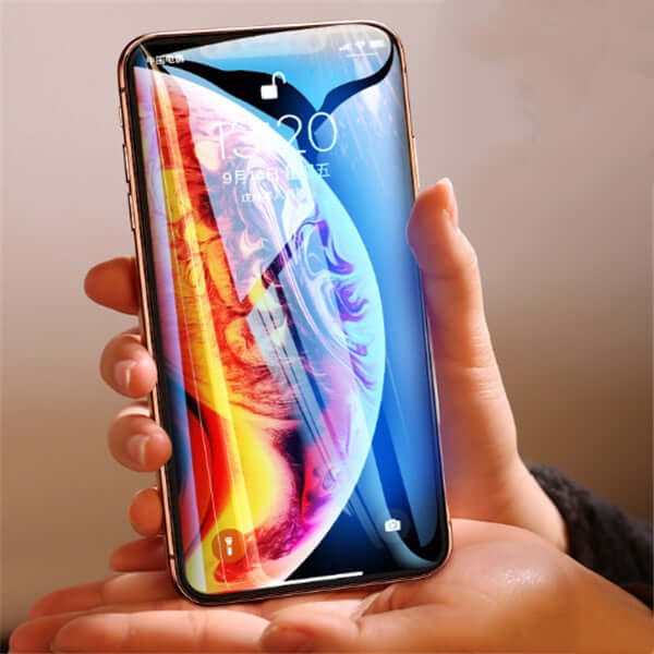Tempered glass screen protector displayed on a hand-held smartphone, showcasing clarity and design.