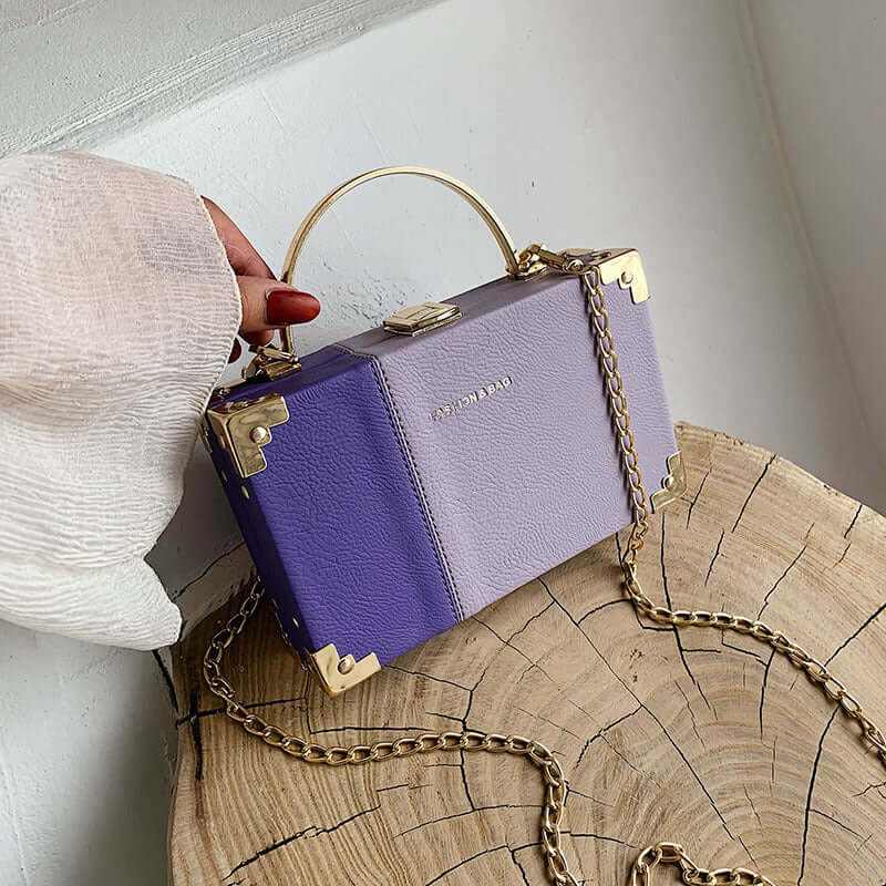 Elegant ladies purple handle clutch purse box with chain, perfect for stylish parties.