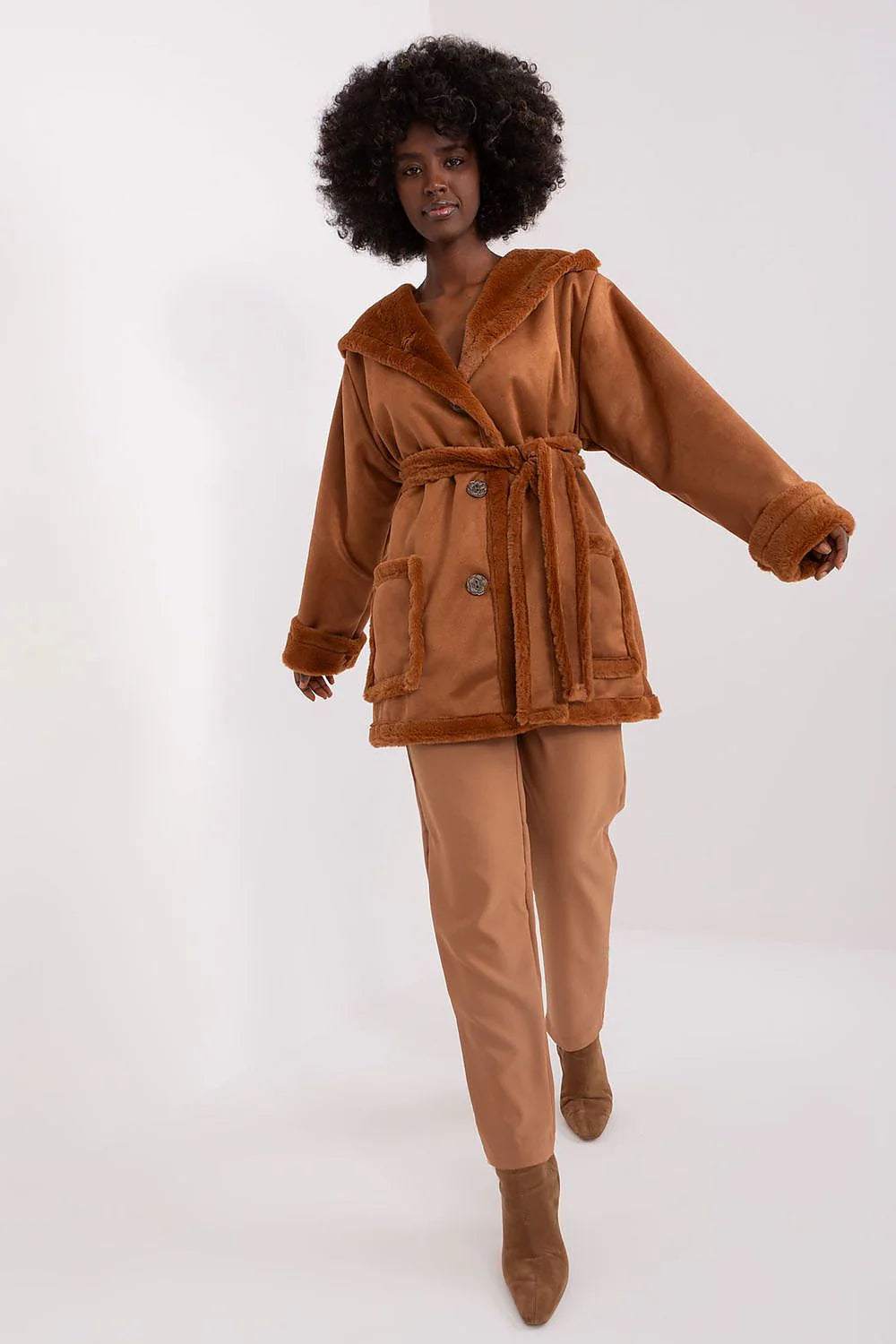 Model wearing Lakerta Elegant Belted Wool Coat in brown, paired with beige pants and heels, showcasing a stylish look.