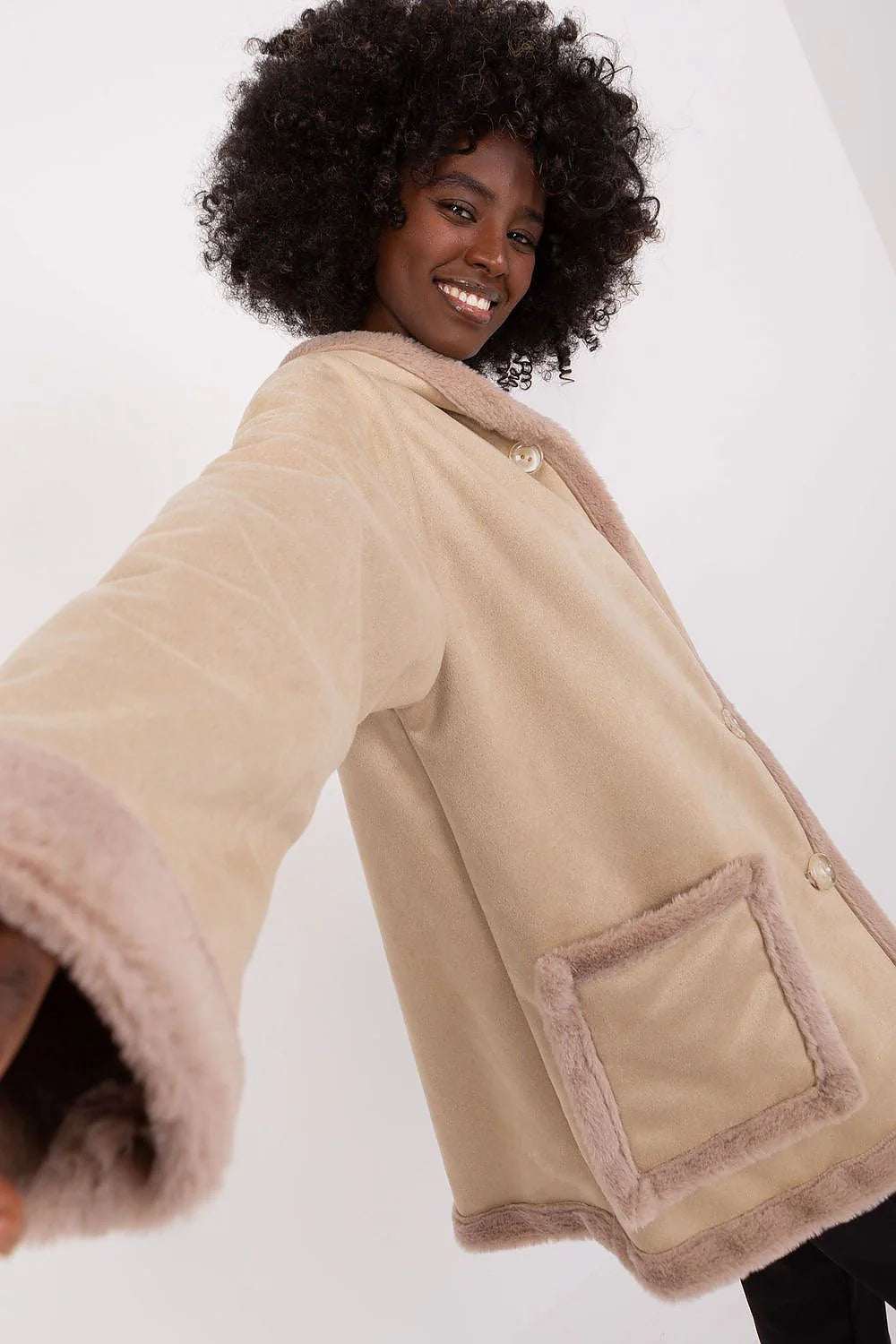 Lakerta Elegant Double Breasted Coat displayed on a smiling model showcasing its stylish and casual design.