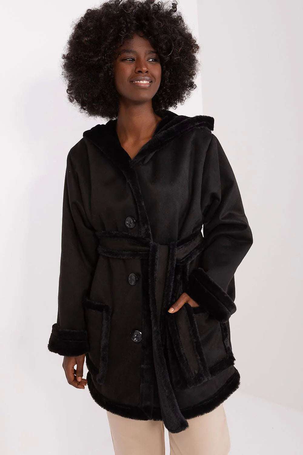Lakerta Minimalist Women’s Fashion Coat in black with hood, offering casual elegance and comfort for winter wear.