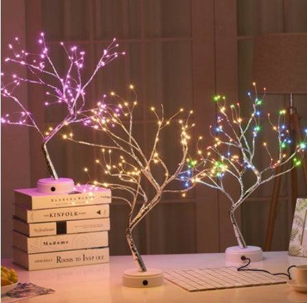 LED Christmas tree night light with 108 multi-color LED lights and touch switch on a white base