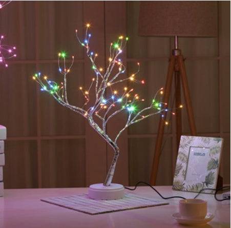 LED Christmas tree night light with 108 multicolor LED lights and touch switch on white base, perfect festive decor