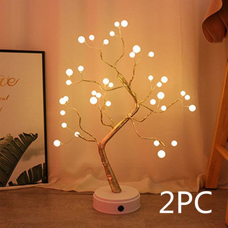 LED Christmas tree night light with warm white glowing bulbs on decorative branches