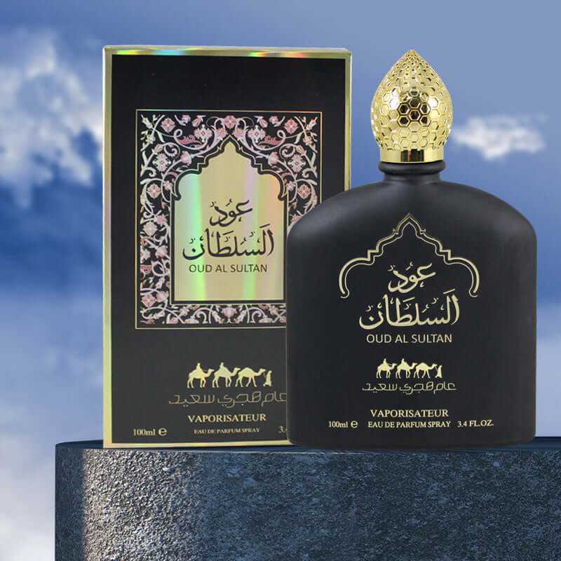 black Oud Al Sultan perfume bottle with ornate gold cap next to matching decorative box against sky background long-lasting Middle Eastern perfumes