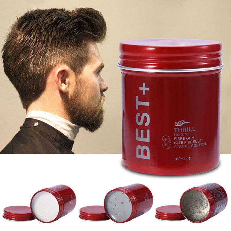 Matte styling hair mud in red container with strong control for textured, fluffy hairstyles on man with styled hair.