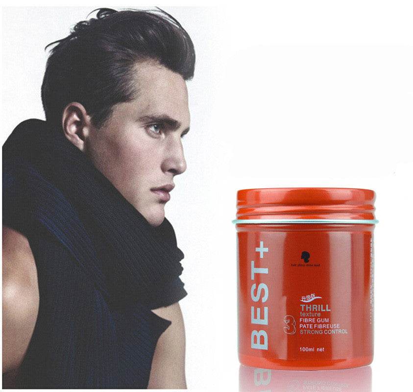 Matte styling hair mud for fluffy, textured, natural-looking hair in orange jar with male model hairstyle.