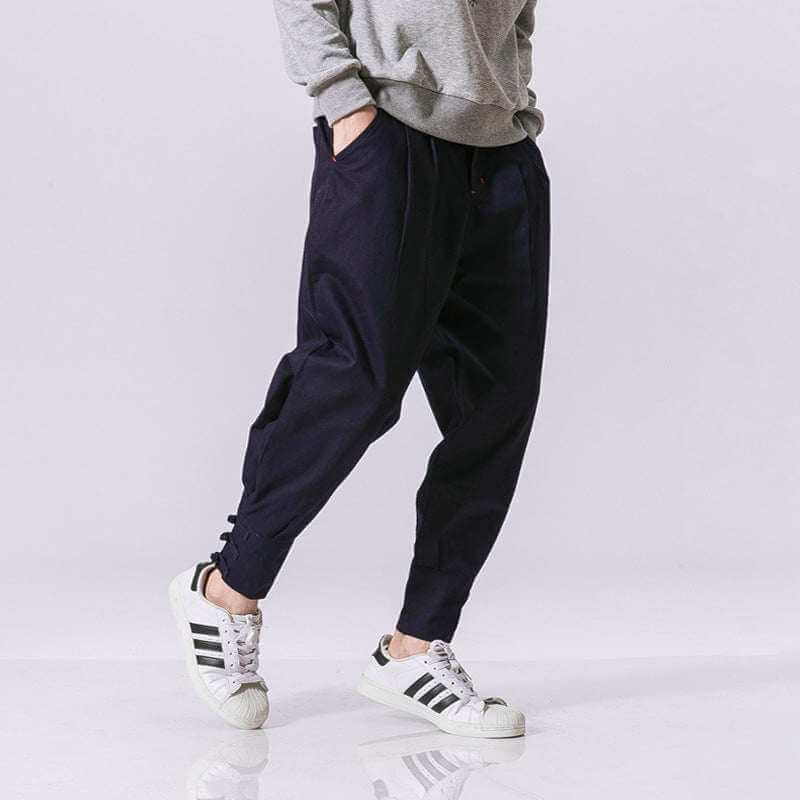 men's buckle casual cotton blend pants in black with relaxed fit and button placket design