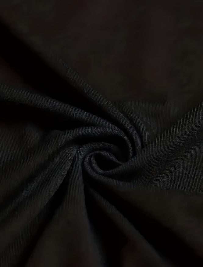 Men's printed short-sleeved t-shirt fabric close-up black polyester blend