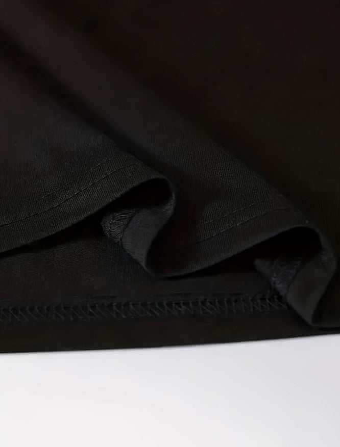 Close-up of black men's printed short-sleeved t-shirt fabric made of polyester and spandex