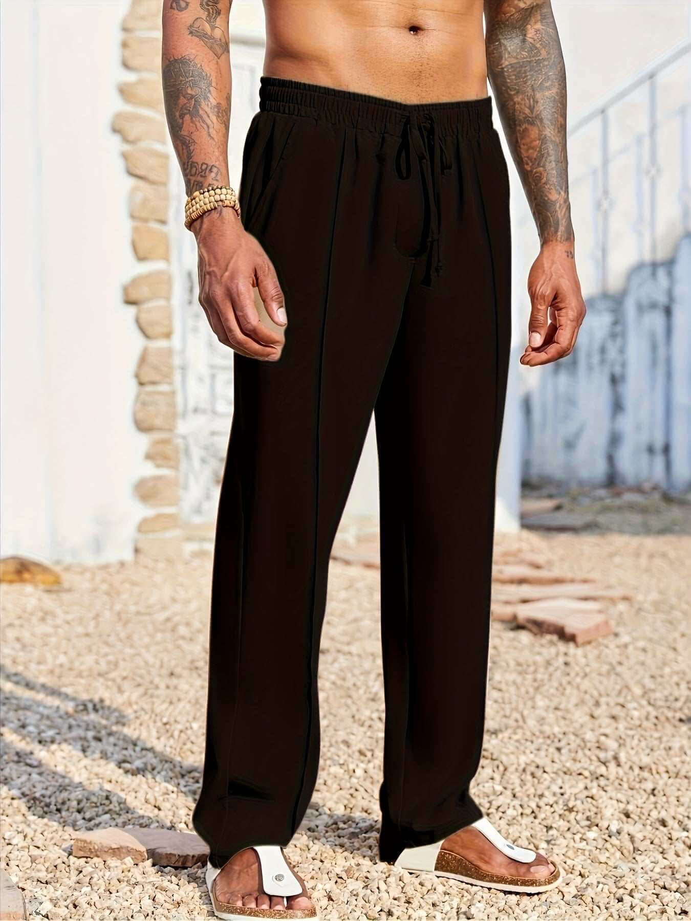 Men's trendy casual black corduroy pants with elastic waistband and drawstring, styled for comfort and fashion