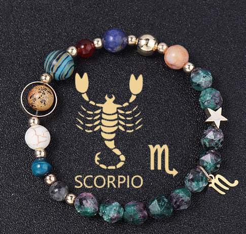 Natural stone Scorpio constellation bracelet with colorful beads and gold accents on black background