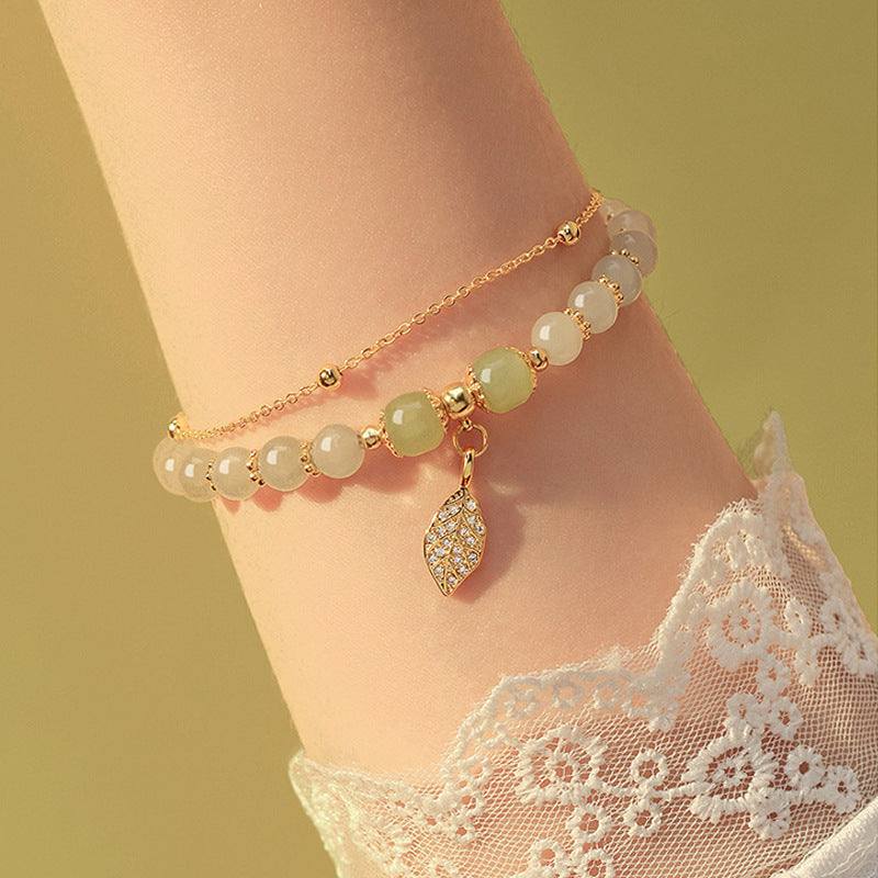 New Chinese style Descendants Of The Rich women's bracelet with mixed material beads, leaf charm, and gold chain, fresh design