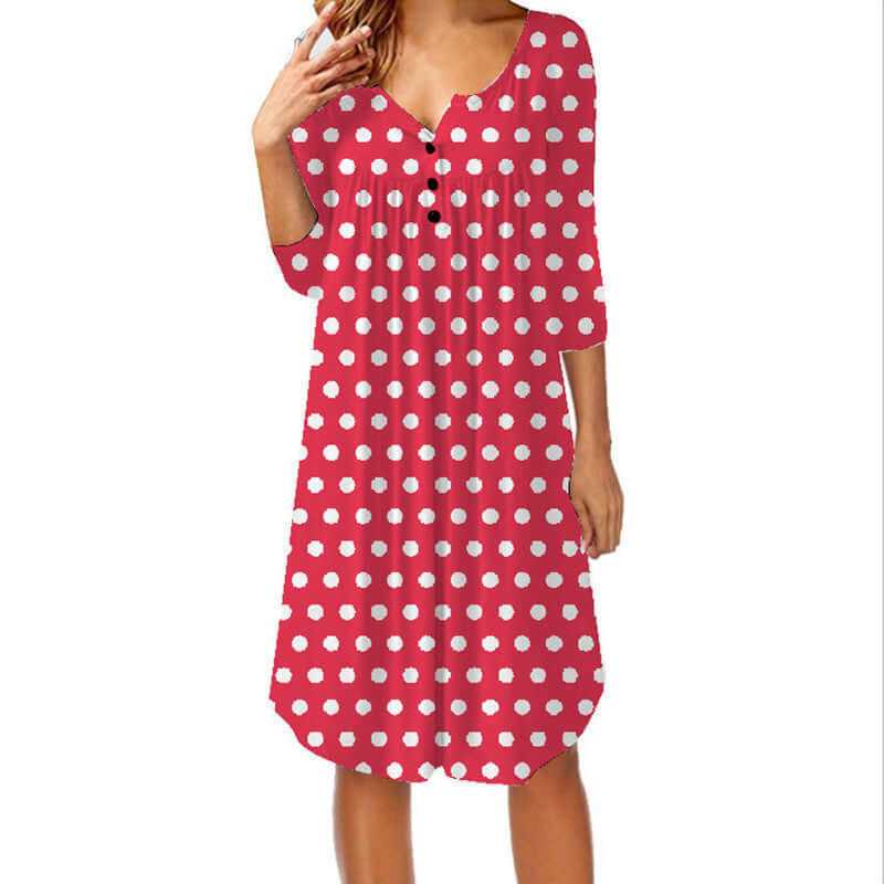 Red polka dot print loose pleated mid-length dress with button front and three-quarter sleeves