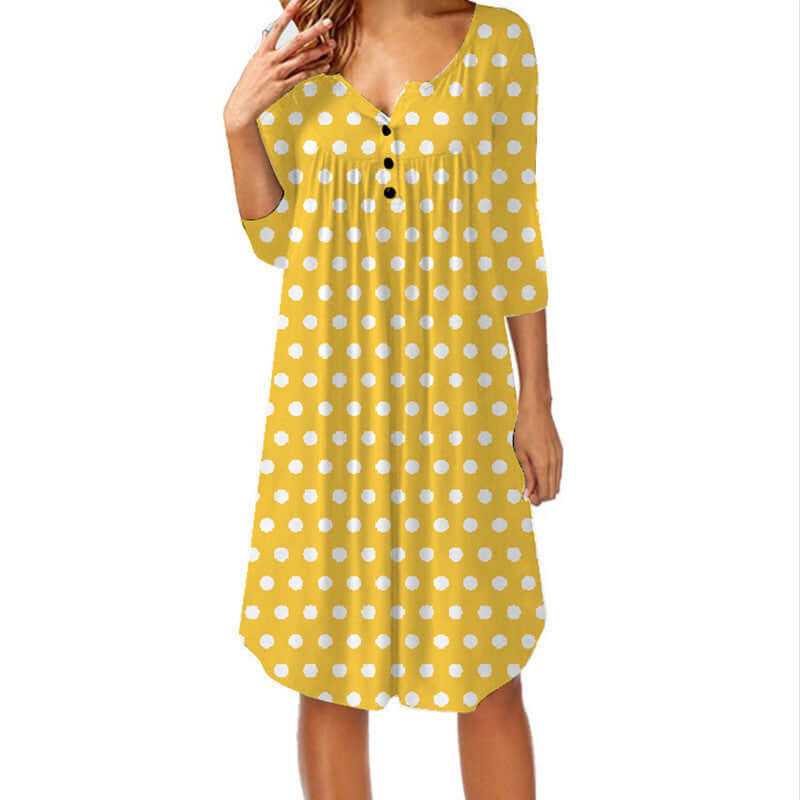 Yellow mid-length polka dot print pleated loose dress with buttons and 3/4 sleeves