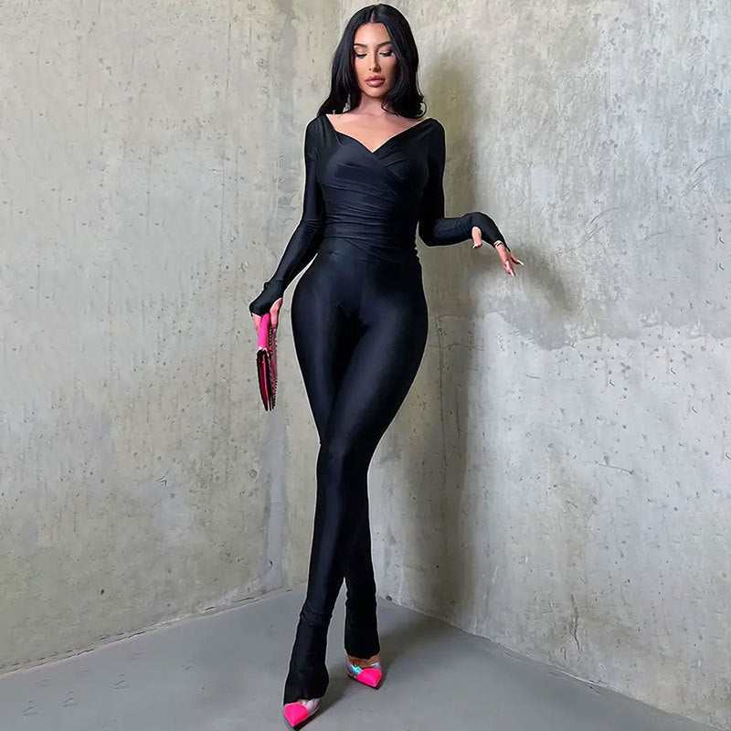 Night Out Women’s black solid color spandex jumpsuit with long sleeves and fitted design for stylish evenings