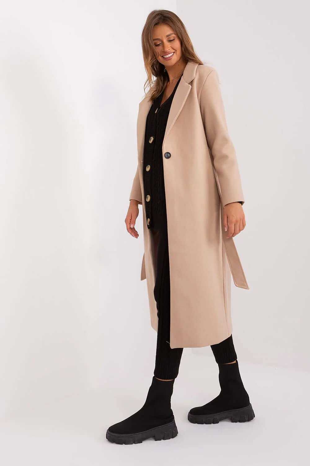 Model wearing Och Bella belted fashion trench coat with slip pockets, styled for casual or formal occasions.